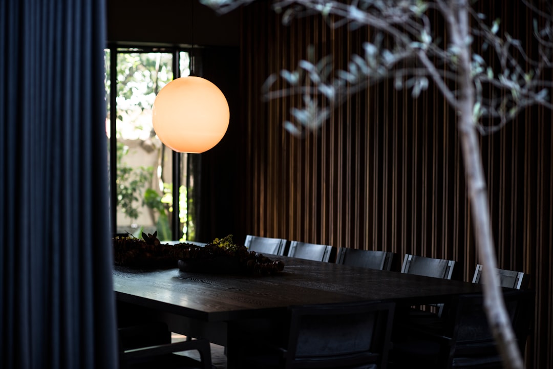 brown wooden table with chairs