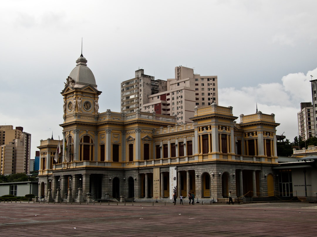 a large building with a clock on the top of it