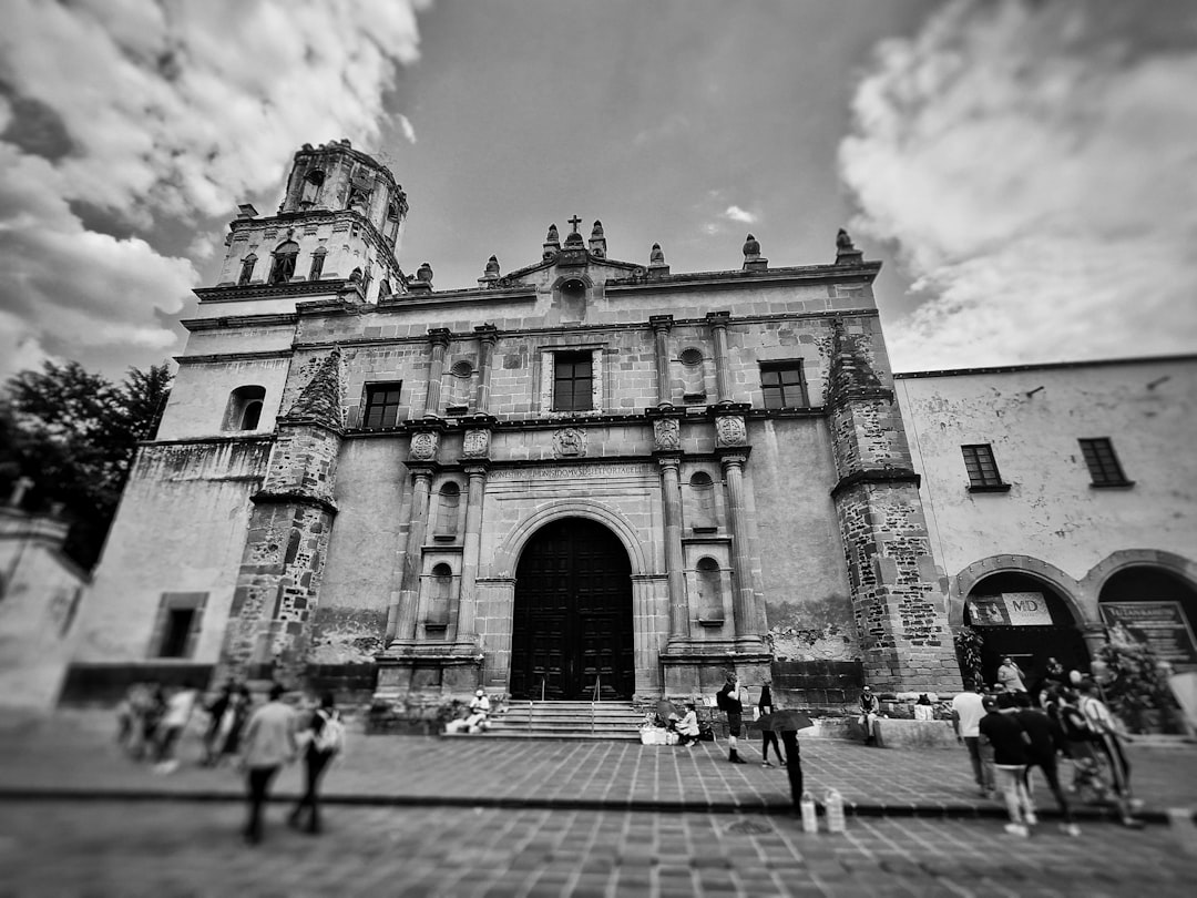 A black and white photo of a large building