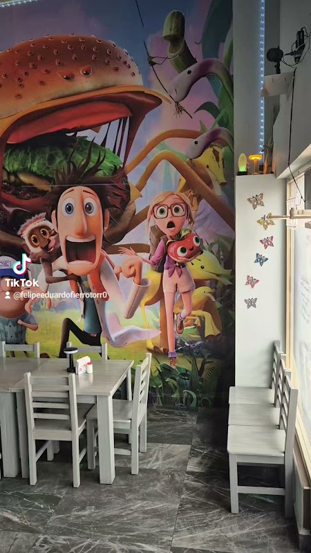 Hamburguesas Hermanos Fierro mostrando su hamburguesa de carbón y la fachada de Mina Barroterán 1338