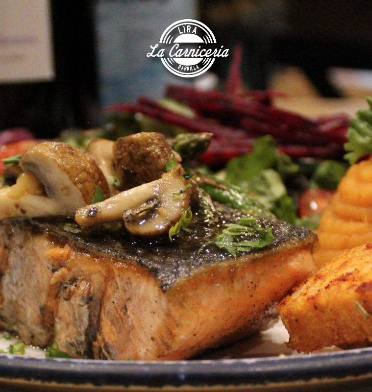 Almaena's barbacoa tacos on a white plate