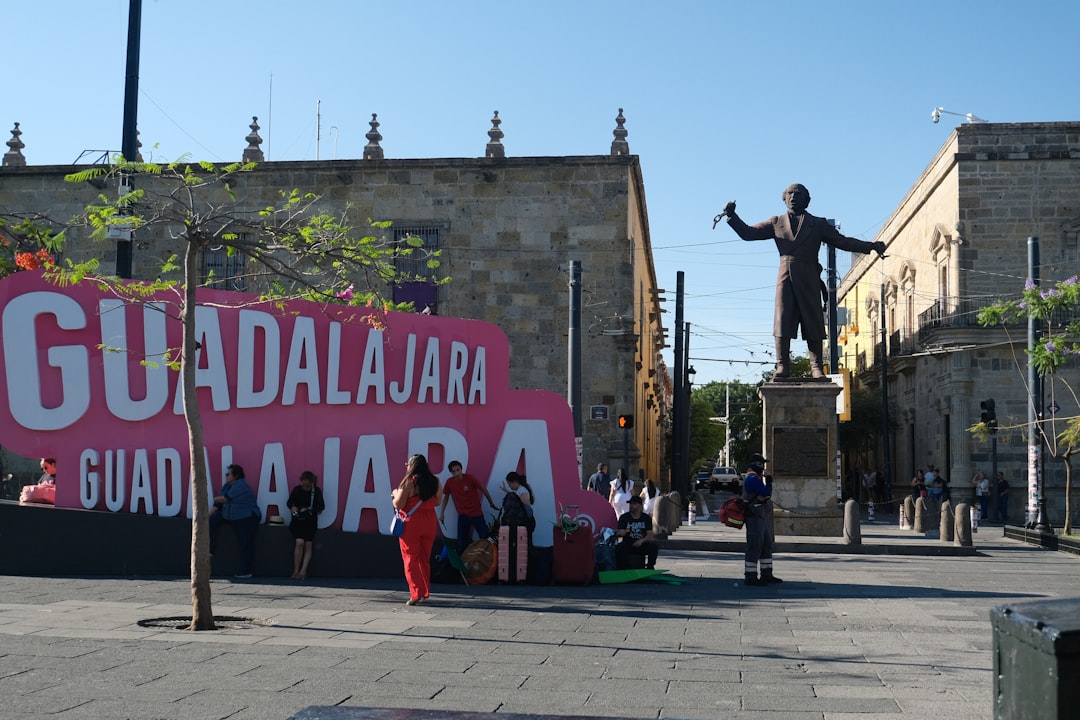 People gather in a guadalajara city square.