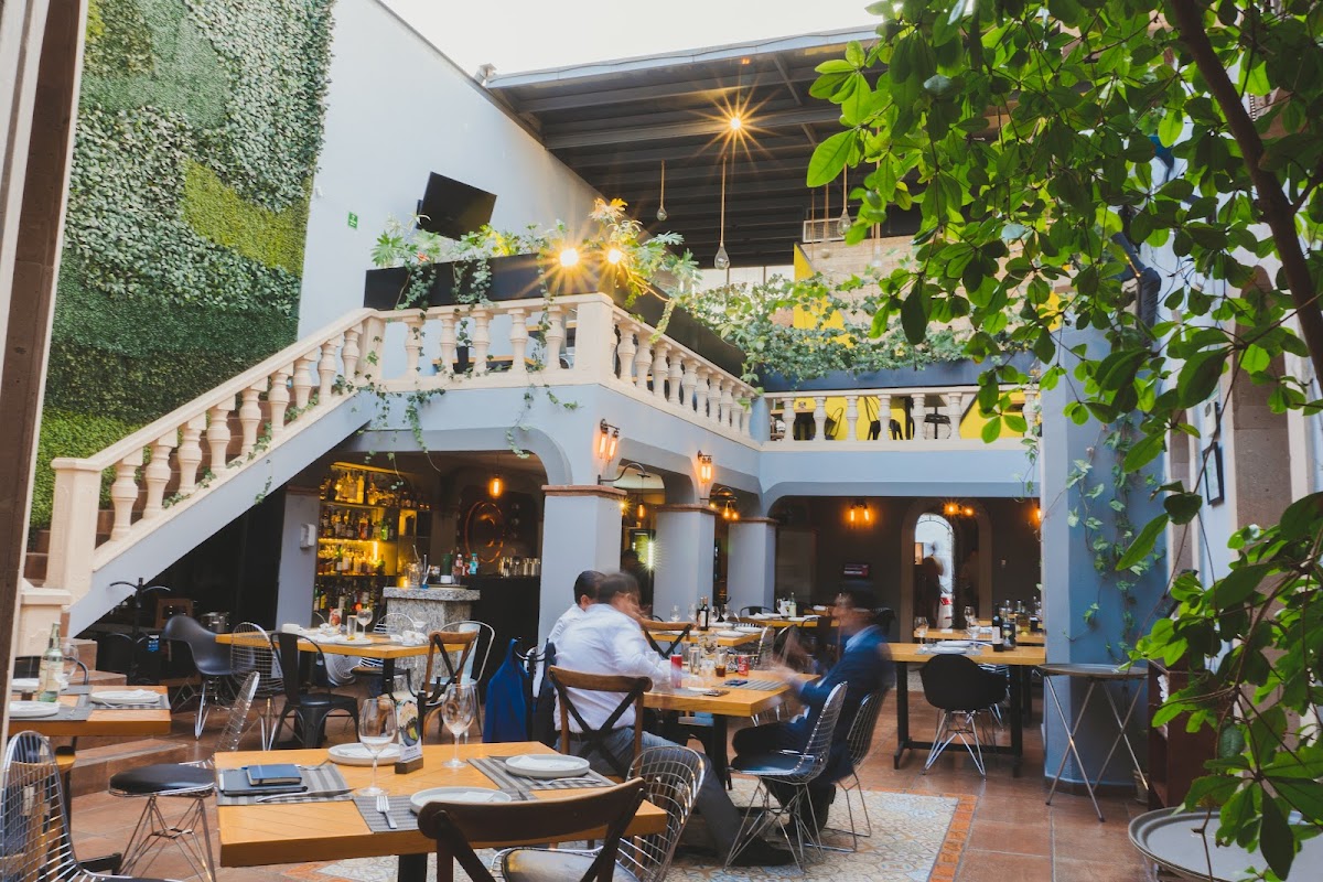 La Casona del Arco’s stone arches and string lights show off its historic Centro location