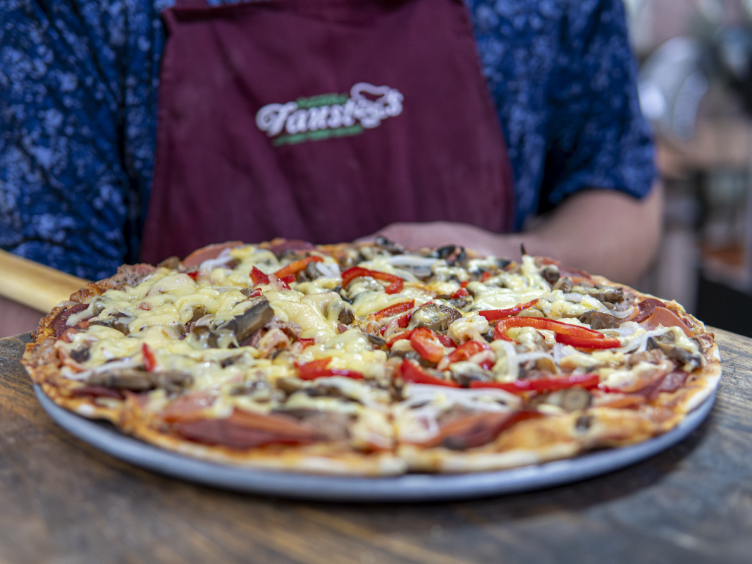 A wood-fired oven at Fausto's | Pizzeria in Mérida