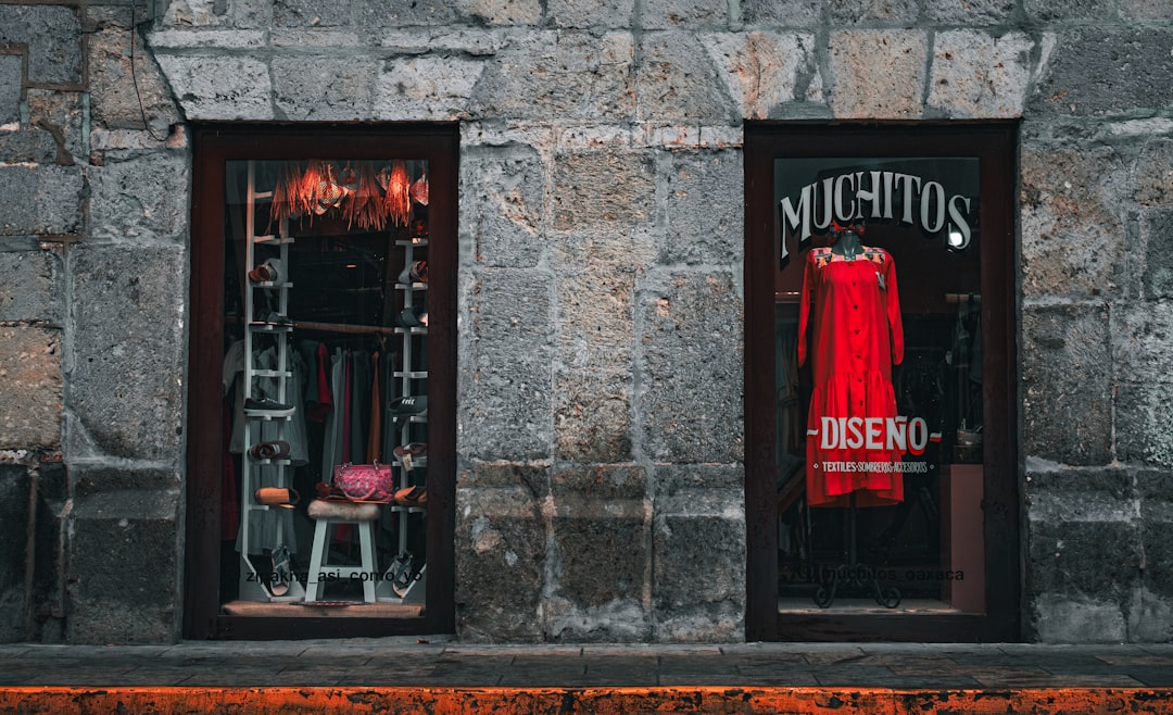 a couple of windows that have clothes in them