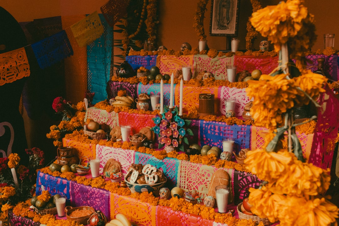 a display of skulls, candles, and decorations