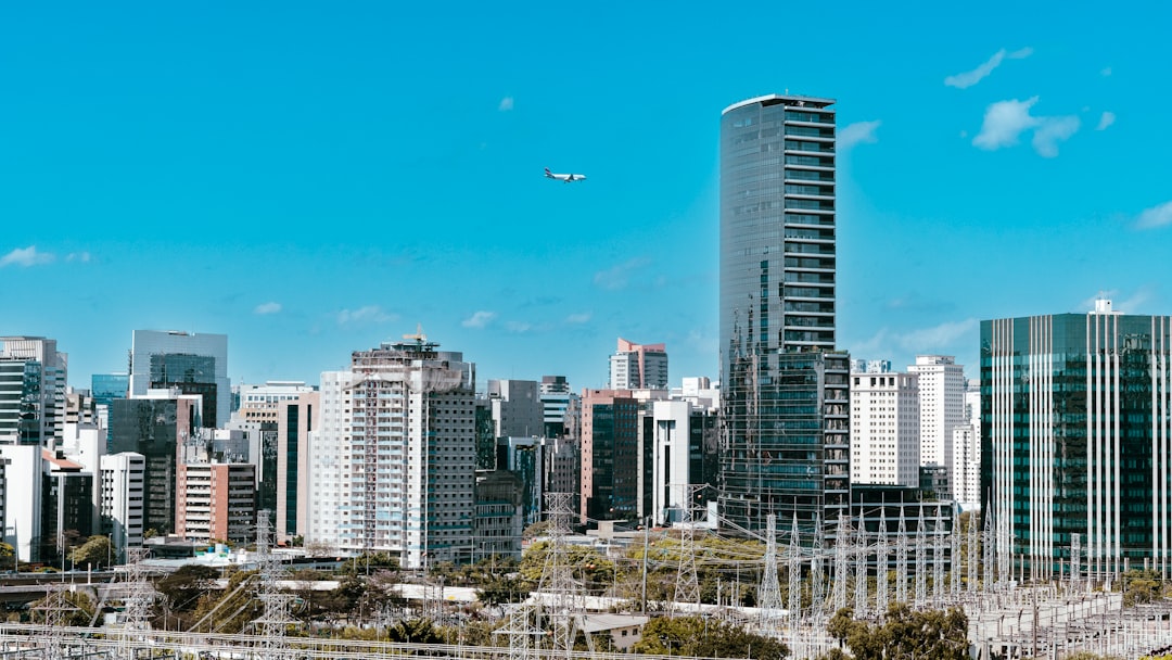 a plane flying over a city